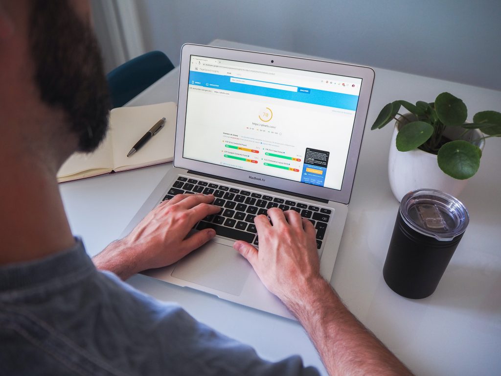 Small business owner reviewing and updating their online business information.